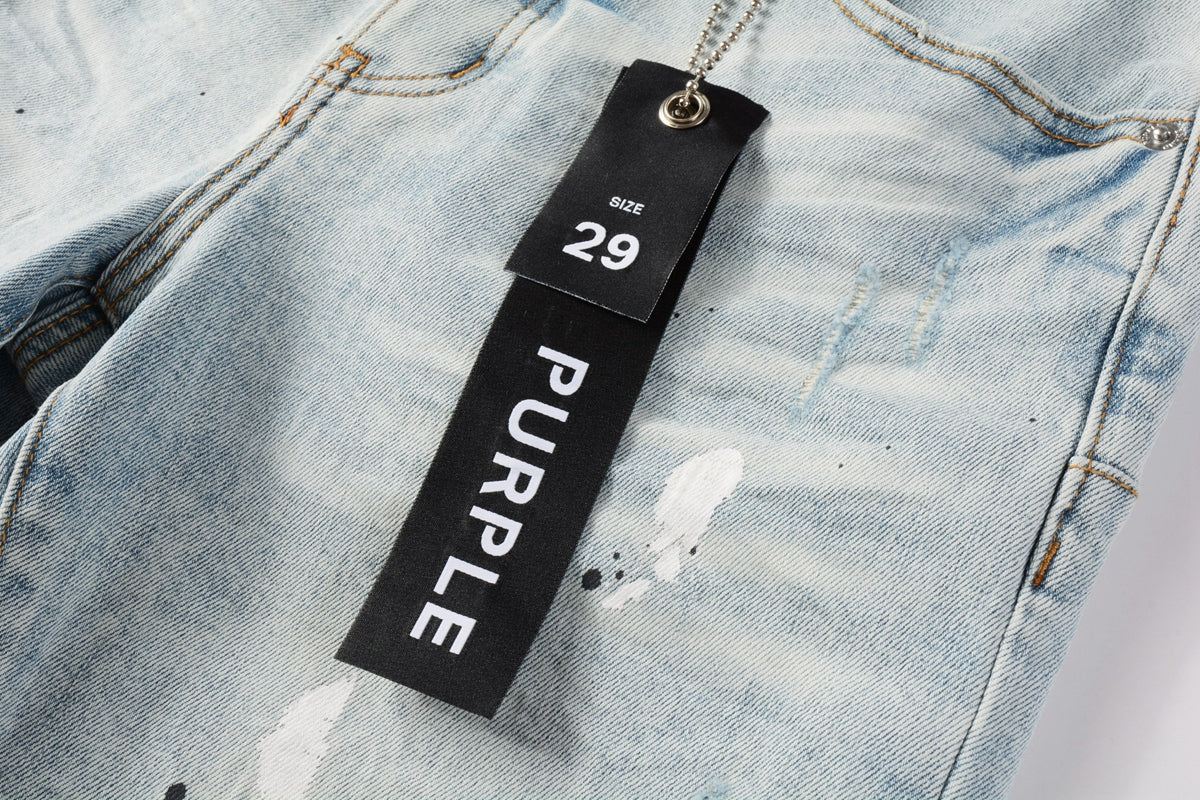 Men Streetwear Denim Shorts Light Blue Wash with White Paint Splatters and Distressed Raw Hem 5006