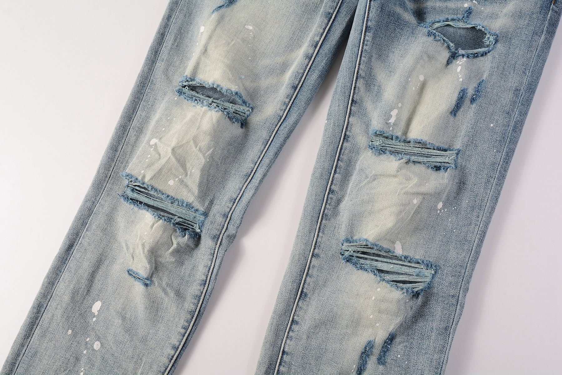 Men Streetwear Skinny Jeans Light Blue Wash with Heavy Distressed Rips and White Paint Splatter 9003