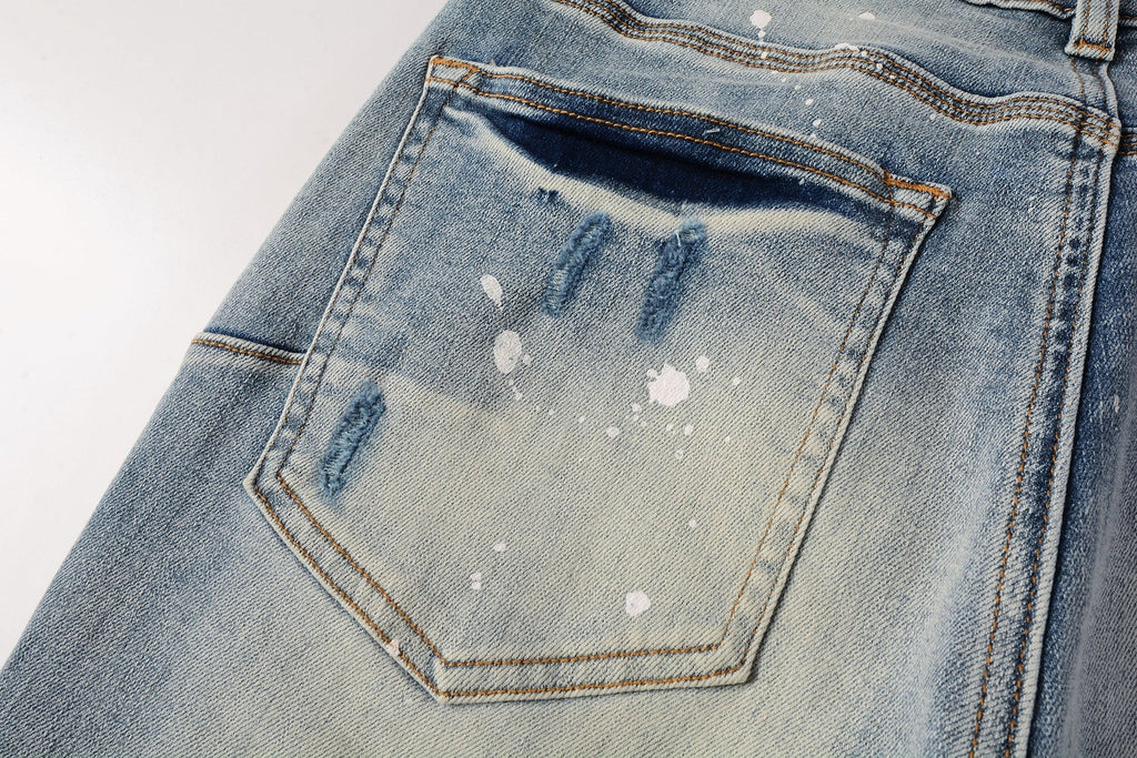 Men Streetwear Skinny Jeans Light Blue Wash with Heavy Distressed Rips and White Paint Splatter 9003