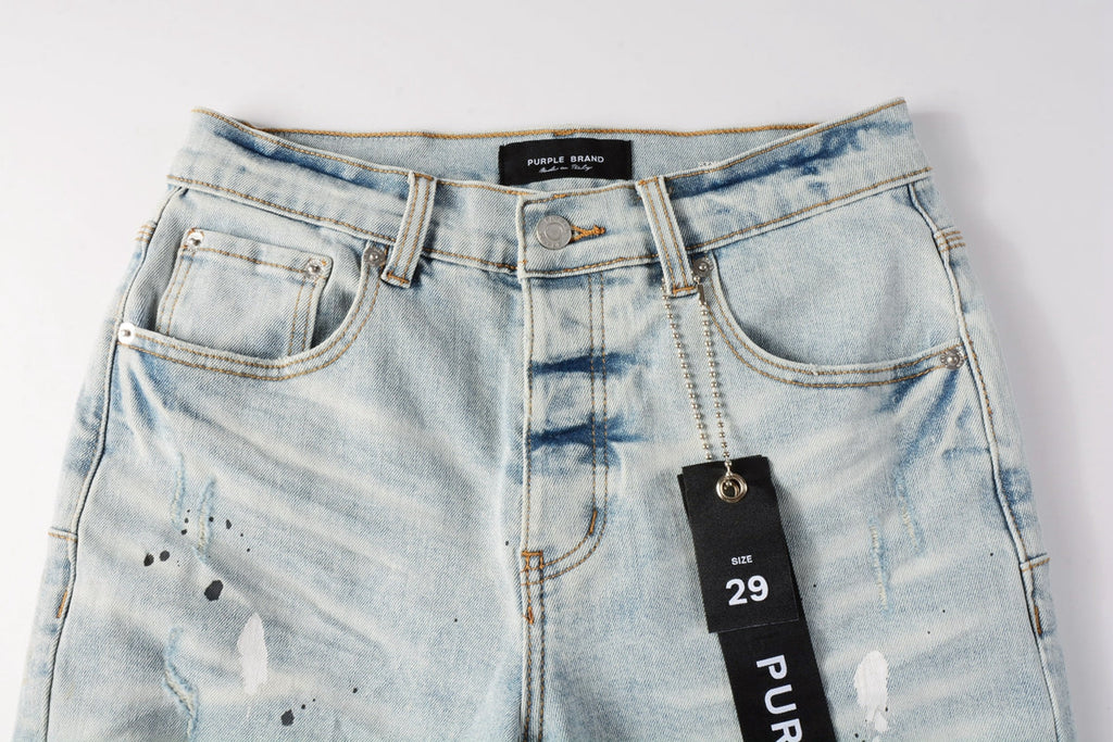 Men Streetwear Denim Shorts Light Blue Wash with White Paint Splatters and Distressed Raw Hem 5006