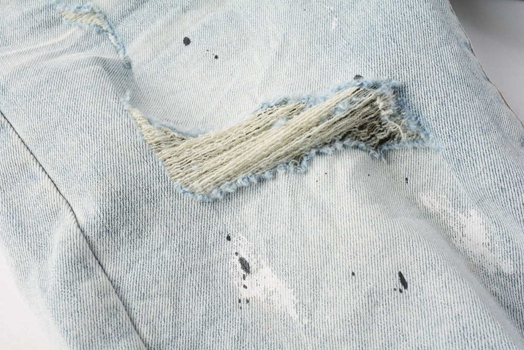 Men Streetwear Denim Shorts Light Blue Wash with White Paint Splatters and Distressed Raw Hem 5006