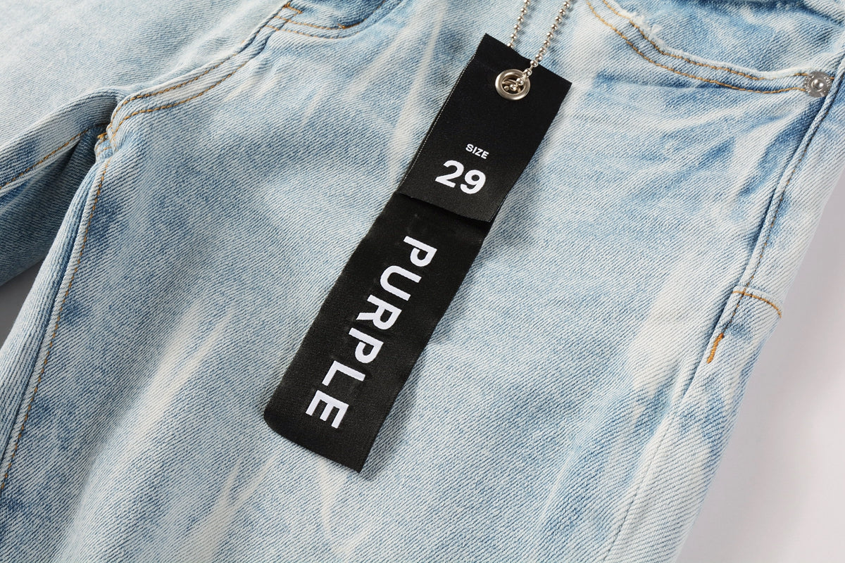 Men Streetwear Denim Shorts Light Blue Wash with White Distressed Patches and Raw Hem 5069