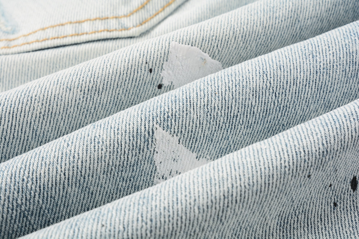 Men Streetwear Denim Shorts Light Blue Wash with White Paint Splatters and Distressed Raw Hem 5006