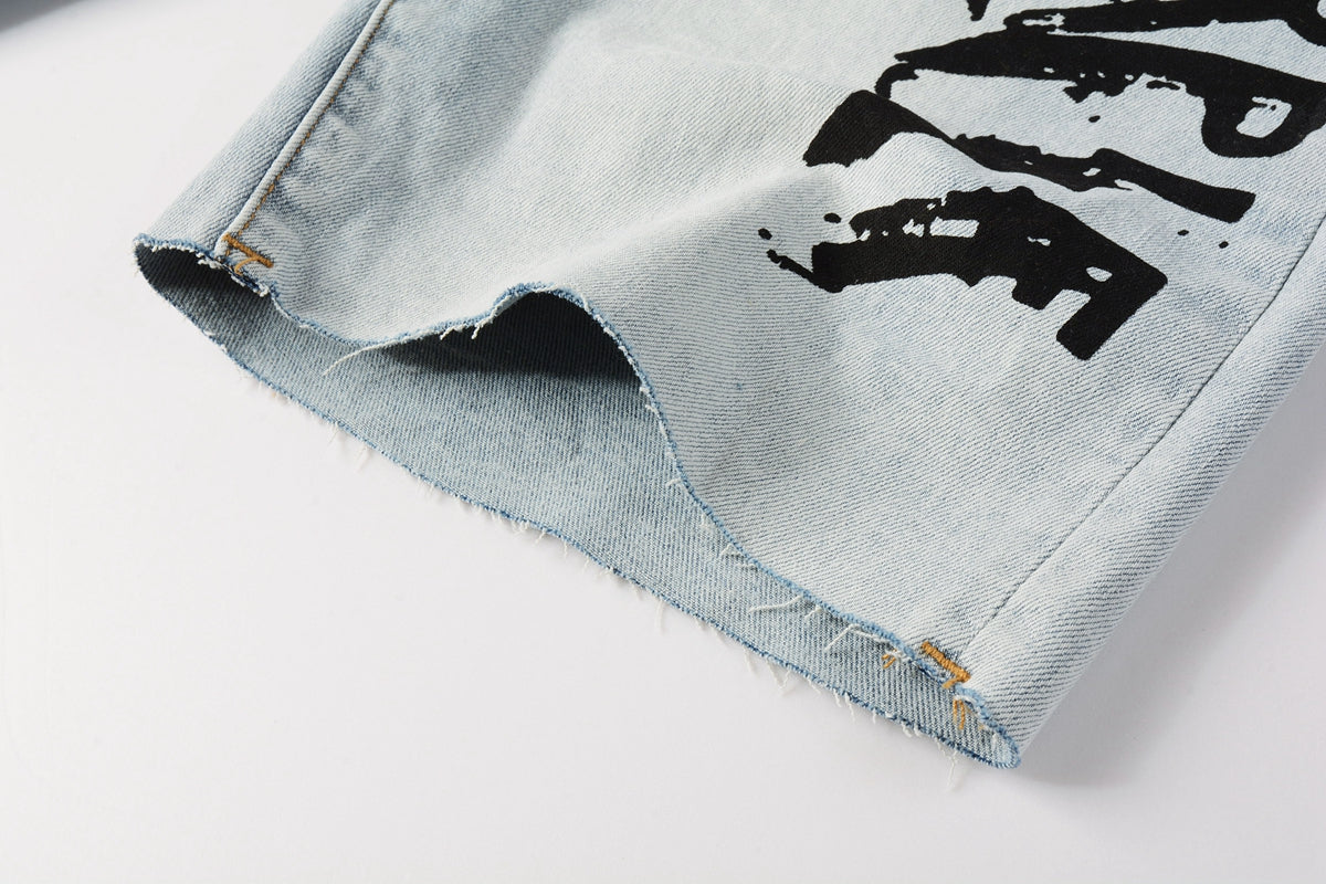 Men Streetwear Denim Shorts Light Blue Wash with Black Paint Streak Print and Raw Hem 5048