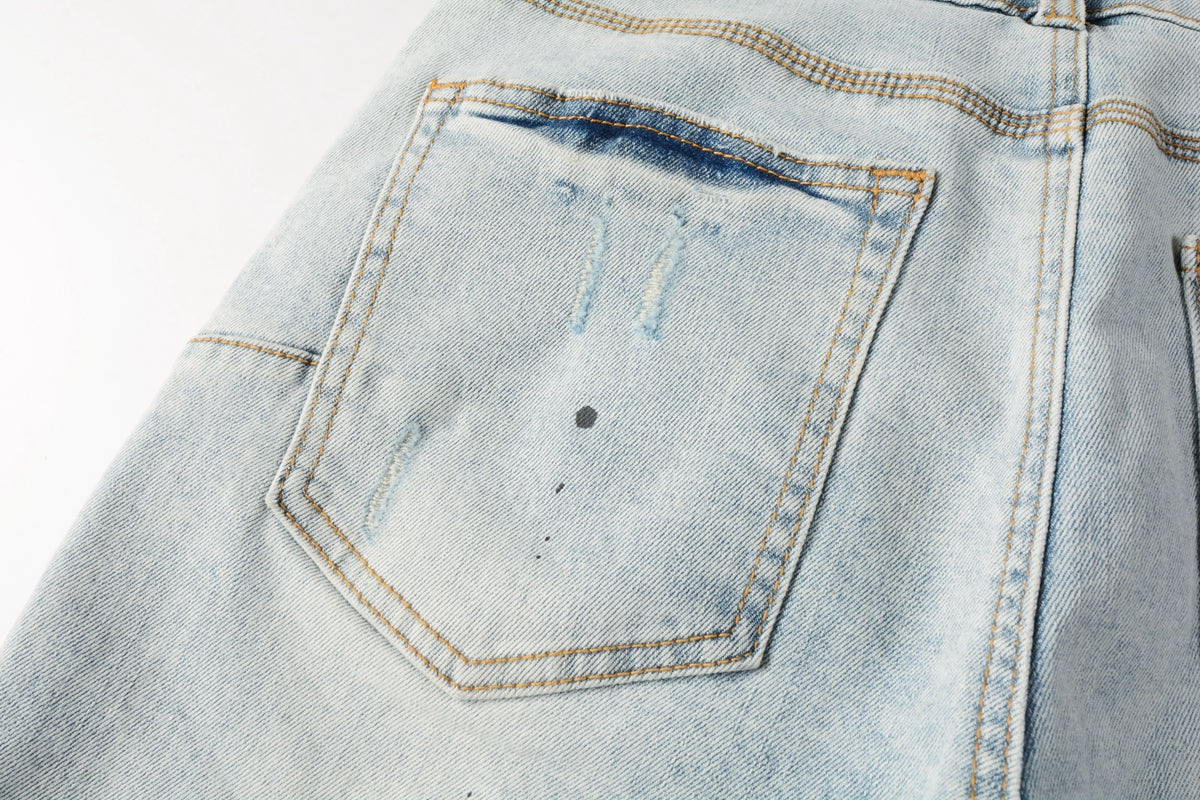 Men Streetwear Denim Shorts Light Blue Wash with White Paint Splatters and Distressed Raw Hem 5006
