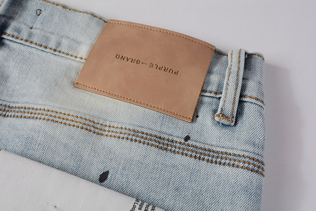 Men Streetwear Skinny Jeans Light Blue Wash with White Paint Splatter and Subtle Distress 9006